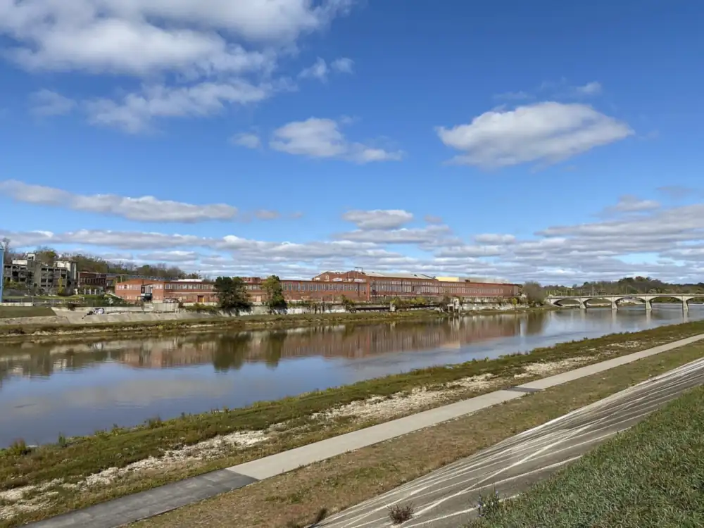 Photograph looking west across the Great Miami River to the Champion Mill complex