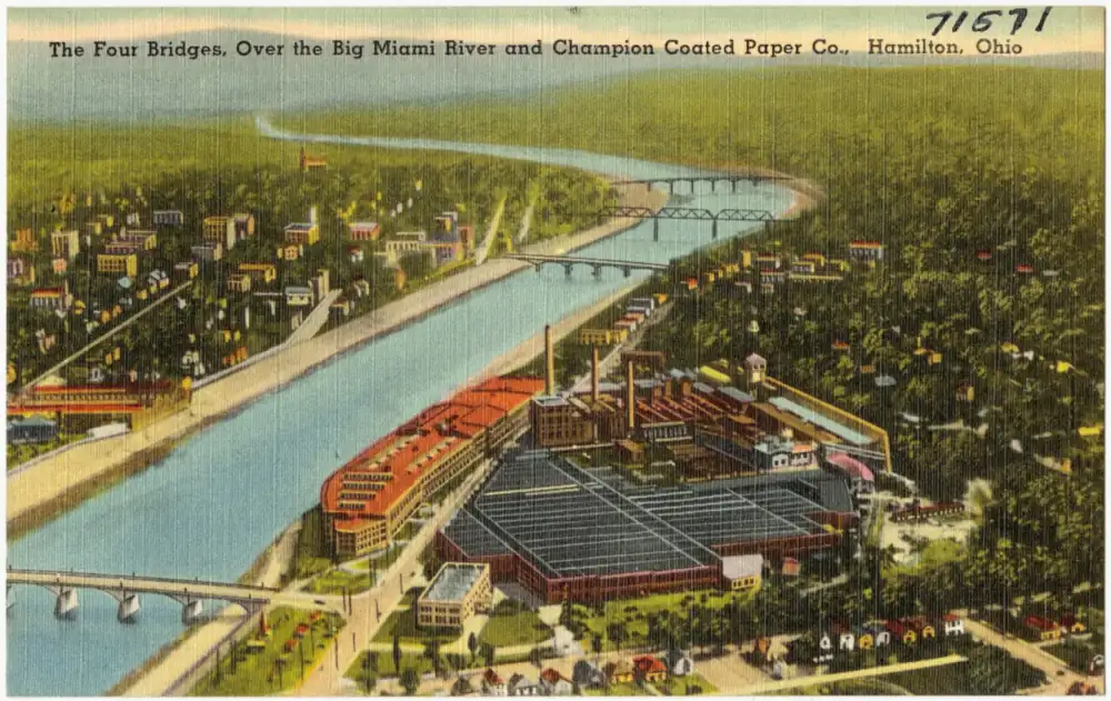 Linen postcard showing four bridges over the Great Miami River with the Champion paper mill beyond