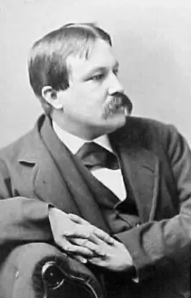 Photographic portrait of a young William Dean Howells