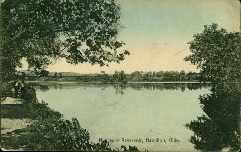 Postcard of the hydraulic reservoir, a wide open body of water